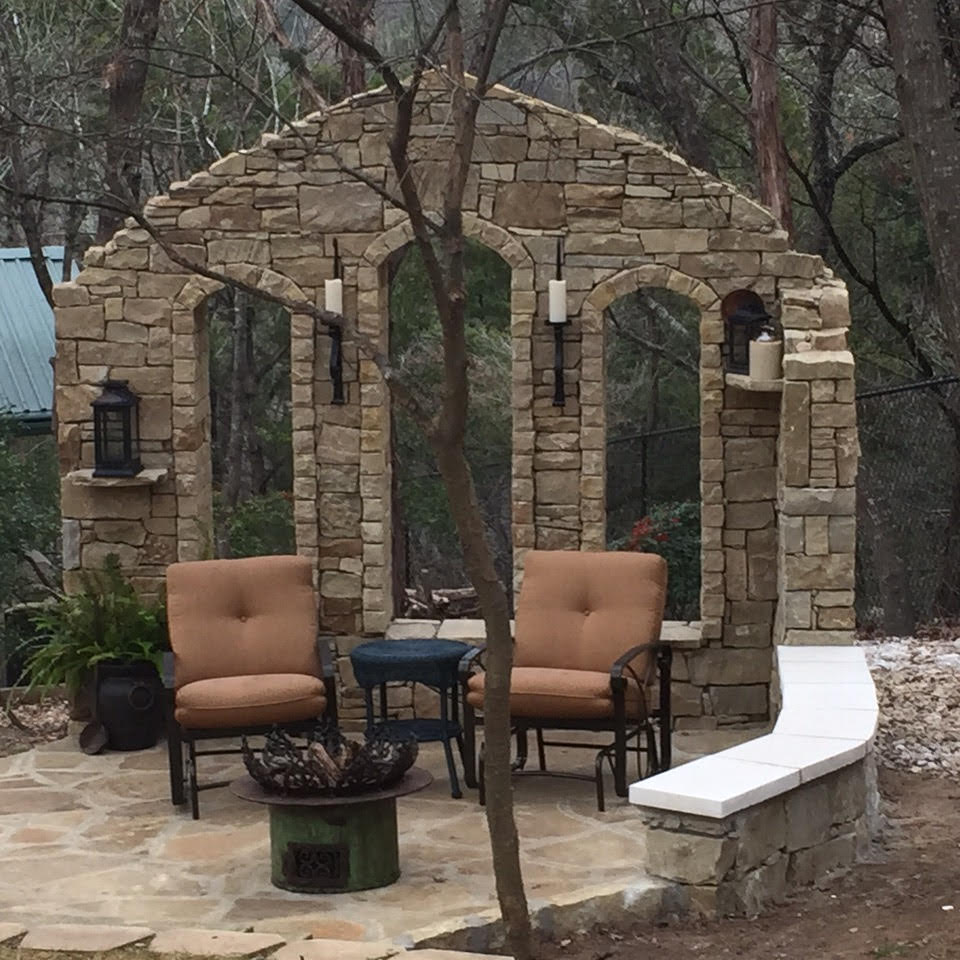 Flagstone patio with stone border built by Legacy Masonry LV in Las Vegas